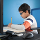 Seven-year-old Hamza Haqqani, a second-grade student at Al-Huda Academy, uses a computer to participate in an online class with his teacher and classmates while at his home on May 1 in Bartlett, Ill.
